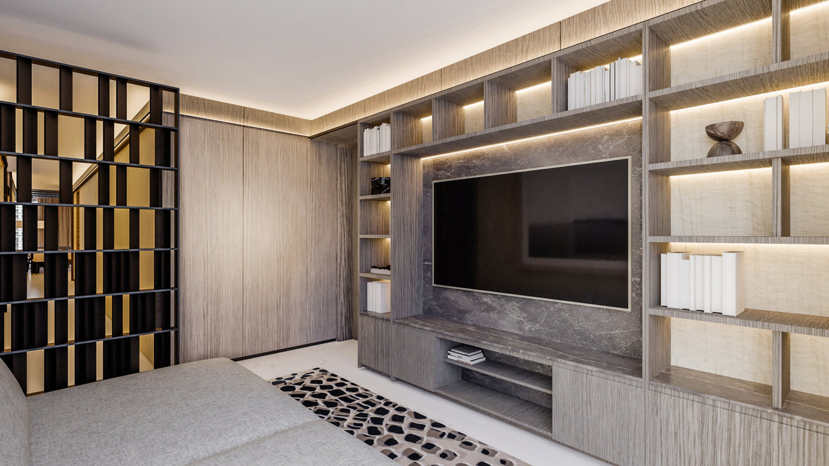 A full wall TV unit with precise carpentry and a clean, balanced layout. The central panel creates a strong focal point, while integrated lighting highlights the shelves and adds warmth.

Built with accurate alignment and smooth finishes, the design keeps a modern, organized look that enhances the entire space.